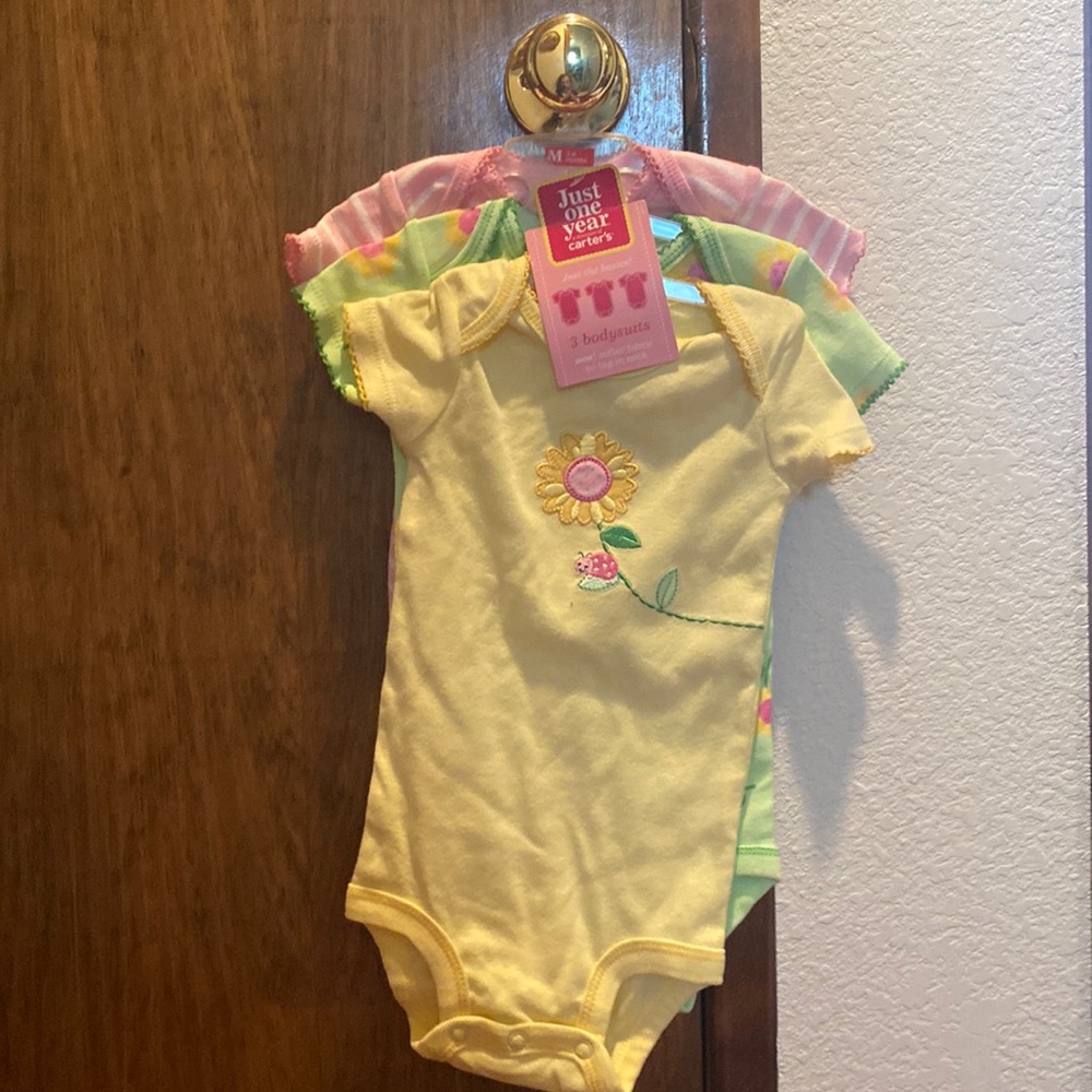 3 baby bodysuits